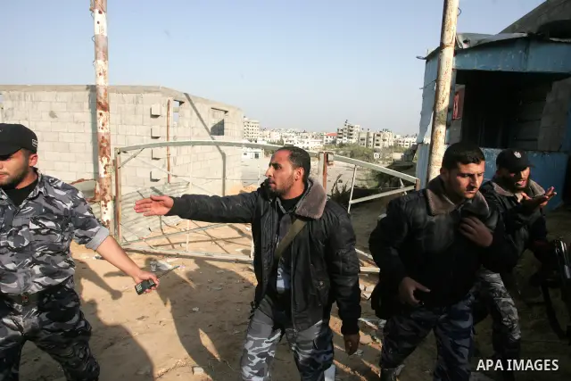 Palestinian security forces inspect bombed Hamas police training camp in Beit Lahia on April 7, 2011 after Israeli troops shelled two separate areas in Gaza, killing one person and wounded at least 10. Photo by Mohammed...