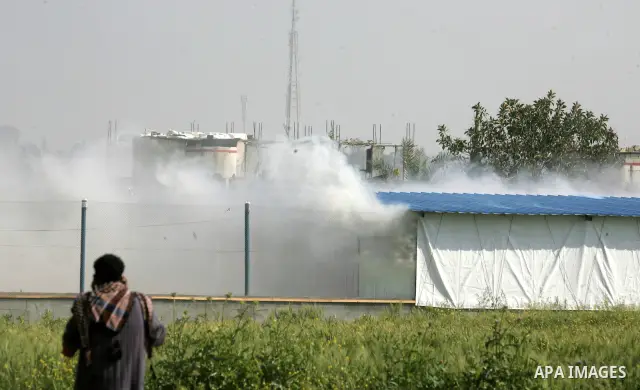 Smoke billows from a bombed Hamas police training camp in Beit Lahia on April 7, 2011 after Israeli troops shelled two separate areas in Gaza, killing one person and wounded at least 10. Photo by Mohammed Othman