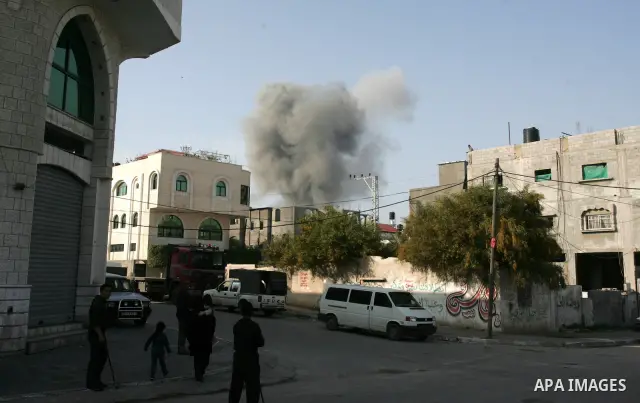 Smoke billows from a bombed Hamas police training camp in Beit Lahia on April 7, 2011 after Israeli troops shelled two separate areas in Gaza, killing one person and wounded at least 10. Photo by Mohammed Othman