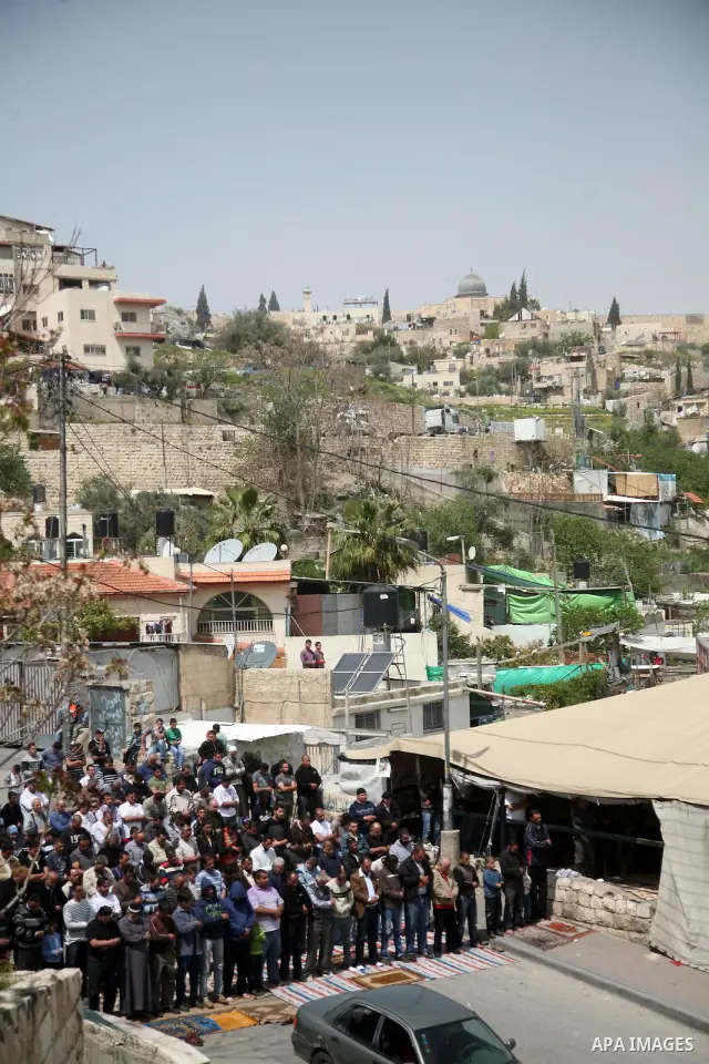 Palestinian demonstrators attend Friday prayers at the protest tent in Jerusalem's neighbourhood of silwan on April 08, 2011. Photo by Sliman Khader