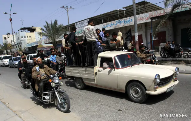 Palestinian mourners Attend funeral of Motaz Abu Jameh in the southern Gaza Strip town of Khan Yunis on April 8, 2011 after Israeli warplanes pounded the coastal strip, killing at least three civilians and two militants...