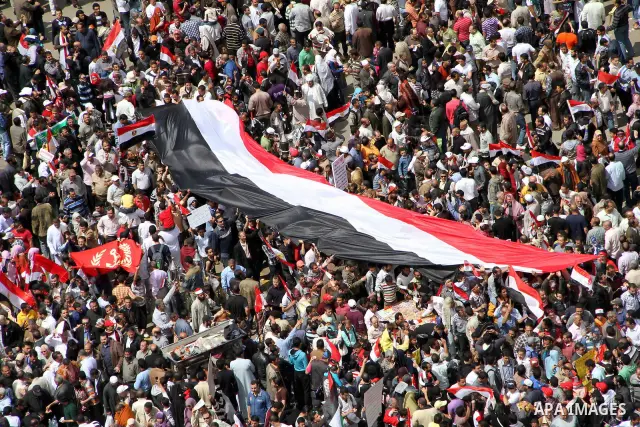 Egyptians perform Friday prayers as tens of thousands gathered for a demonstration at Cairo's Tahrir Square on April 8, 2011, two months after president Hosni Mubarak was ousted, to demand that former regime officials in...