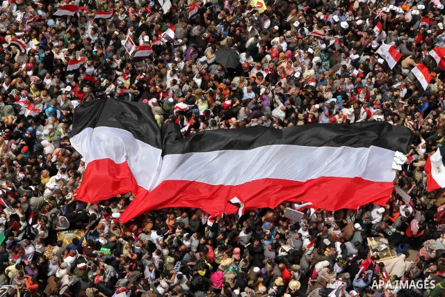 Egyptians perform Friday prayers as tens of thousands gathered for a demonstration at Cairo's Tahrir Square on April 8, 2011, two months after president Hosni Mubarak was ousted, to demand that former regime officials in...