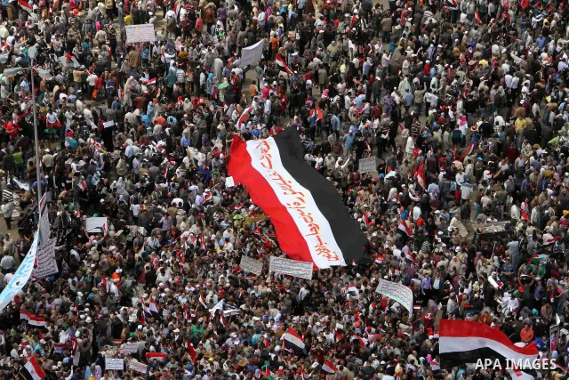 Egyptians perform Friday prayers as tens of thousands gathered for a demonstration at Cairo's Tahrir Square on April 8, 2011, two months after president Hosni Mubarak was ousted, to demand that former regime officials in...
