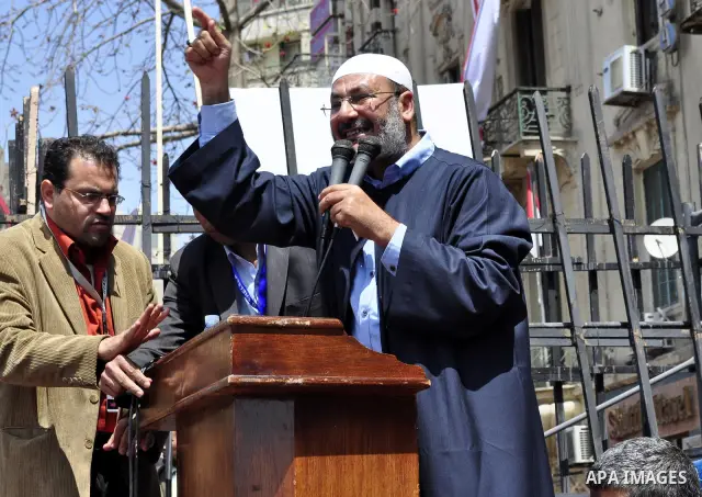 Egyptians perform Friday prayers as tens of thousands gathered for a demonstration at Cairo's Tahrir Square on April 8, 2011, two months after president Hosni Mubarak was ousted, to demand that former regime officials in...