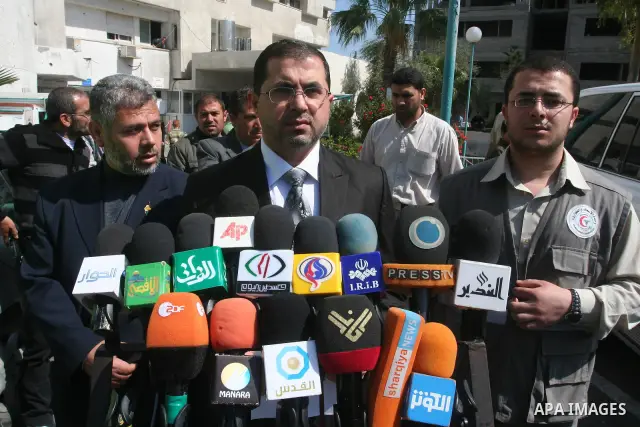 Palestinian Health minister in Gaza Strip, Basim Naem participates in a press conference in Gaza City, April 9, 2011. as the Israeli army pounded the Gaza Strip, killing at least 12 people as militants fired dozens of mo...