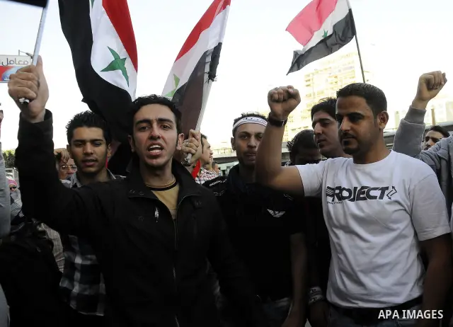 Syrians living in Egypt demonstrate against the recent actions of the Syrian government and in support of protesters at Tahrir Square, Cairo, Egypt on April 10,2011. Syrian security forces opened fire in the coastal town...
