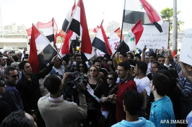 Syrians living in Egypt demonstrate against the recent actions of the Syrian government and in support of protesters at Tahrir Square, Cairo, Egypt on April 10,2011. Syrian security forces opened fire in the coastal town...