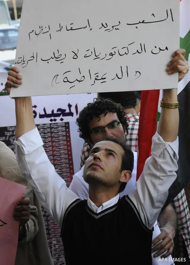 Syrians living in Egypt demonstrate against the recent actions of the Syrian government and in support of protesters at Tahrir Square, Cairo, Egypt on April 10,2011. Syrian security forces opened fire in the coastal town...