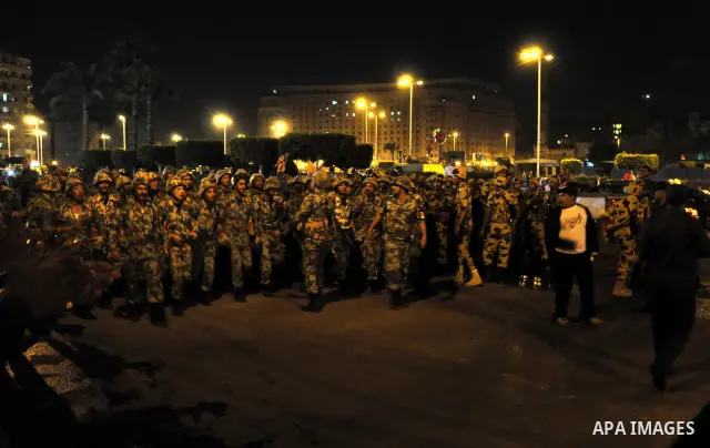Egyptian Army soldiers take control of the symbolic center of Cairo after demonstrators removed barricades blocking traffic from entering the Tahrir square, Cairo, Egypt on April 12,211. Egyptians retook Tahrir Square de...