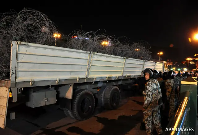 Egyptian Army soldiers take control of the symbolic center of Cairo after demonstrators removed barricades blocking traffic from entering the Tahrir square, Cairo, Egypt on April 12,211. Egyptians retook Tahrir Square de...