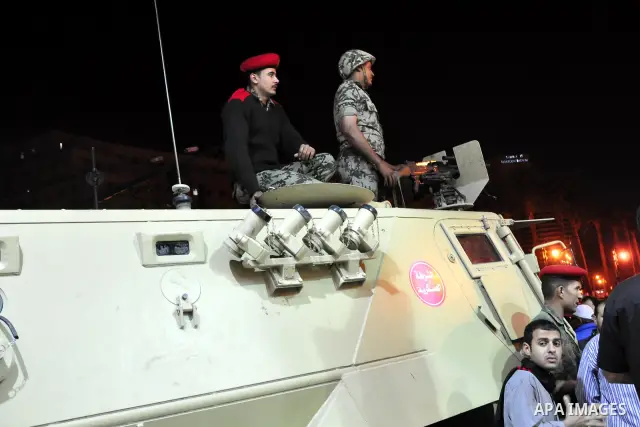 Egyptian Army soldiers take control of the symbolic center of Cairo after demonstrators removed barricades blocking traffic from entering the Tahrir square, Cairo, Egypt on April 12,211. Egyptians retook Tahrir Square de...