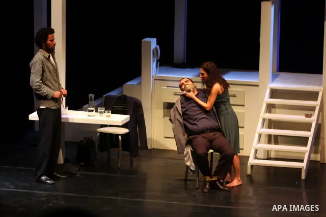 Palestinians perform scenes from the play "The Death of the Virgin" at the conclusion of the Festival "Days of lighthouse" in the West Bank city of Ramallah April 13, 2011. Photo by Issam Rimawi