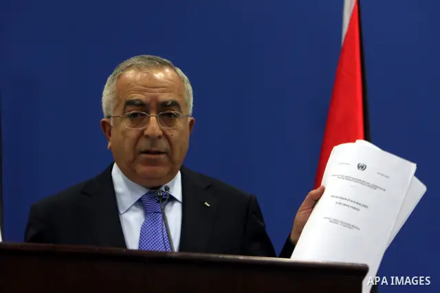 Palestinian Prime Minister Salam Fayyad addressing the media during a press conference at his office in the West Bank town of Ramallah, about the results of the donors meeting held in Brussels, on 14 April 2011, Fayyad m...
