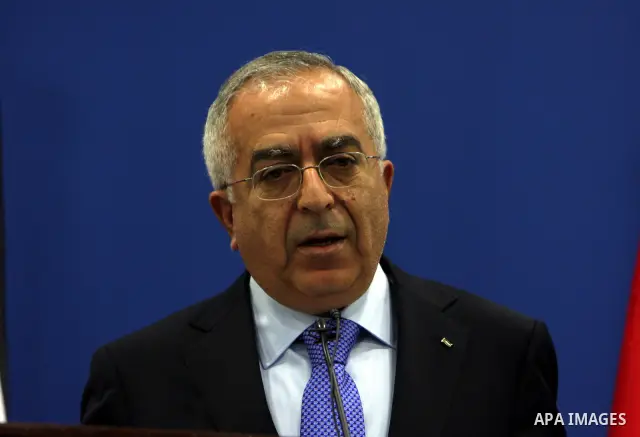 Palestinian Prime Minister Salam Fayyad addressing the media during a press conference at his office in the West Bank town of Ramallah, about the results of the donors meeting held in Brussels, on 14 April 2011, Fayyad m...