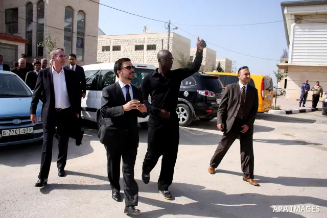 Former French football player Lilian Thuram and the Palestinian Football Association chairman Jibril Rajoub attend the inauguration of a 9,000-capacity stadium, at Al-Bireh, on the outskirts of the West Bank political an...