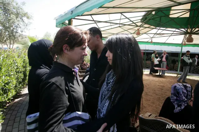 Palestinians and foreigners mourn the death of International Solidarity Movement member Vittorio Arrigoni, 36, who was kidnapped and killed by a Salafist group of radical Islamist, during a protest in Gaza City. Internat...