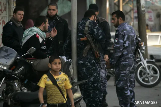 Members of Hamas' security forces patrol in the Gaza border town of Rafah, on April 16, 2011, after a radical Islamist group killed an Italian activist just hours after kidnapping him. The Hamas government said today it...