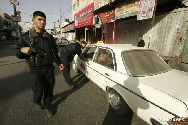 Members of Hamas' security forces patrol in the Gaza border town of Rafah, on April 16, 2011, after a radical Islamist group killed an Italian activist just hours after kidnapping him. The Hamas government said today it...