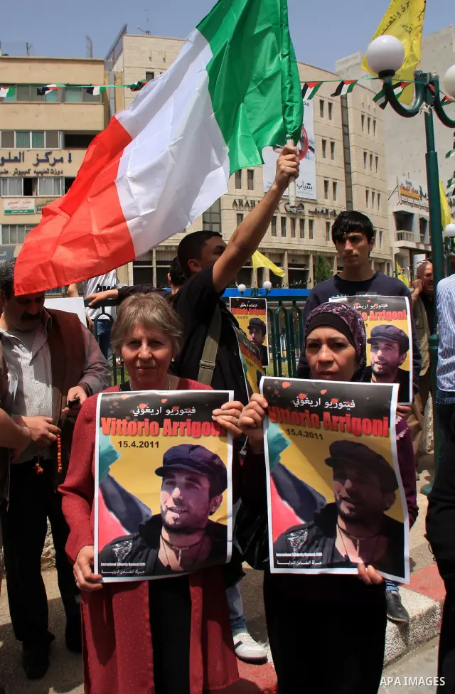 Palestinians and foreign activists take part in a protest against the killing of Italian activist Vittorio Arrigoni in the West bank city of Nablus April 16, 2011. Photo by Wagdi Eshtayah