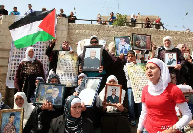 March from the Damascus Gate in East Jerusalem to the Red Cross headquarters where the Palestinian Legislative Council sitters since 290 days, demanding the release of prisoners from Israeli jails. April 16 2011. Sliman...