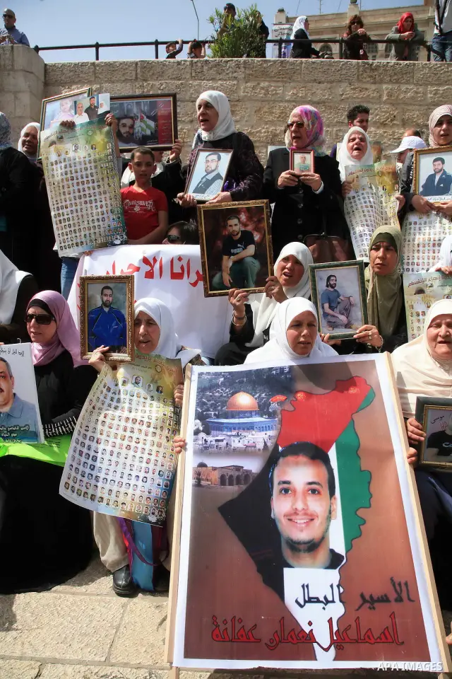 March from the Damascus Gate in East Jerusalem to the Red Cross headquarters where the Palestinian Legislative Council sitters since 290 days, demanding the release of prisoners from Israeli jails. April 16 2011. Sliman...