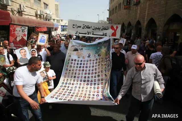March from the Damascus Gate in East Jerusalem to the Red Cross headquarters where the Palestinian Legislative Council sitters since 290 days, demanding the release of prisoners from Israeli jails. April 16 2011. Sliman...