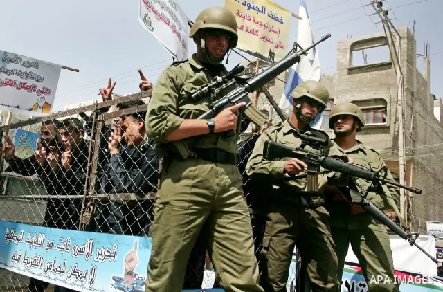 Palestinians participate in a rally, one of several taking place across the Israeli occupied West Bank and Gaza Strip, calling for the release of Palestinians being held in Israeli jails, as they mark Palestinian Prisone...