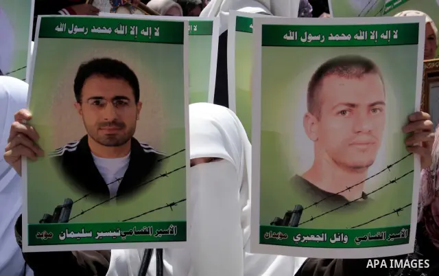 Palestinians take part in a rally, one of several taking place across the Israeli occupied West Bank and Gaza Strip calling for the release of Palestinians being held in Israeli jails, as they mark Palestinian Prisoner's...