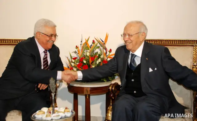 Palestinian President Mahmoud Abbas arrives to Tunisia on April 18,2011. Photo by Mohammed Al Rawas