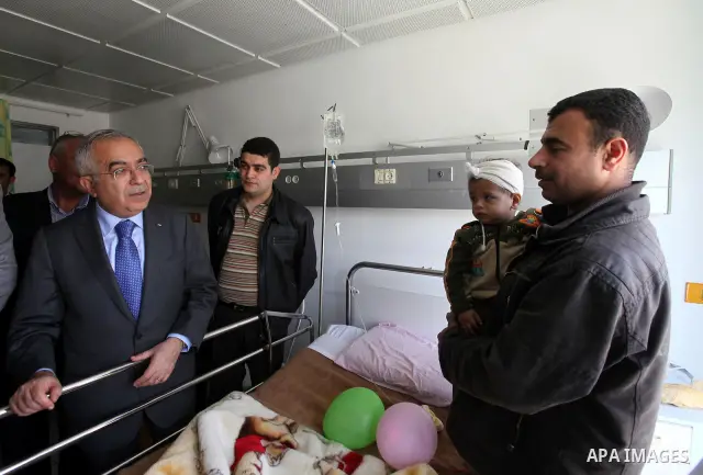 Palestinian Pime Minister, Salam Fayyad during the opening of the draft electronic implant for the deaf, dumb and hearing-impaired at the Bethlehem Arab Society for Rehabilitation on April 19,2011. Photo by Mustafa Abu D...