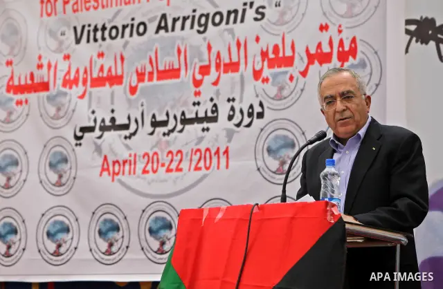 Palestinian Pime Minister, Salam Fayyad attends the opening ceremony of the Bilin 6th international conference in the West Bank city of Ramallah on April 20,2011. Photo by Mustafa Abu Dayeh