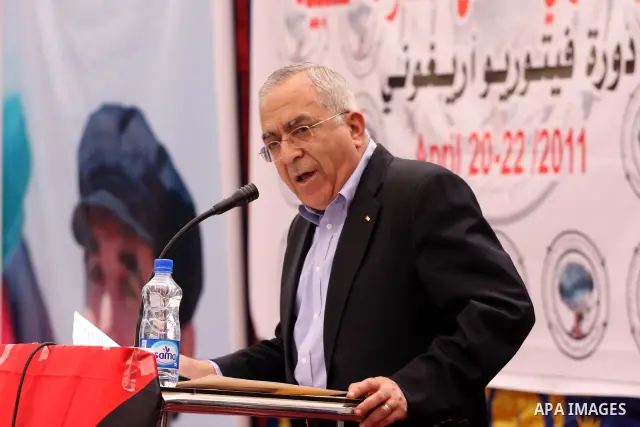 Palestinian prime minister Salam Fayyad participates the opening ceremony of the 6th Bilin international conference for Palestinian Popular Resistance on April 20, 2011 in West Bank village of Bilin, near Ramallah. Fayya...