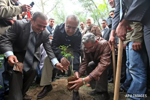 Palestinian Pime Minister, Salam Fayyad Involved people of Deir Ammar, planting trees within the campaign "We have roots" in West Bank city of Ramallah on April 23,2011. Photo by Mustafa Abu Dayeh