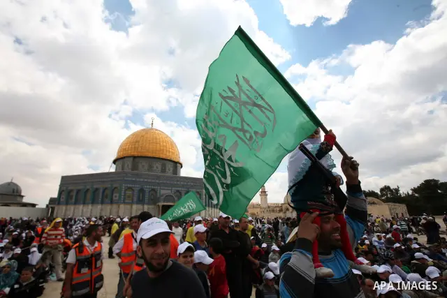 Palestinians take part in a celebration " The box of Al Aqsa child" in front of the Dome of the Rock on the compound known to Muslims as al-Haram al-Sharif, and to Jews as Temple Mount in Jerusalem's Old City on April 23...
