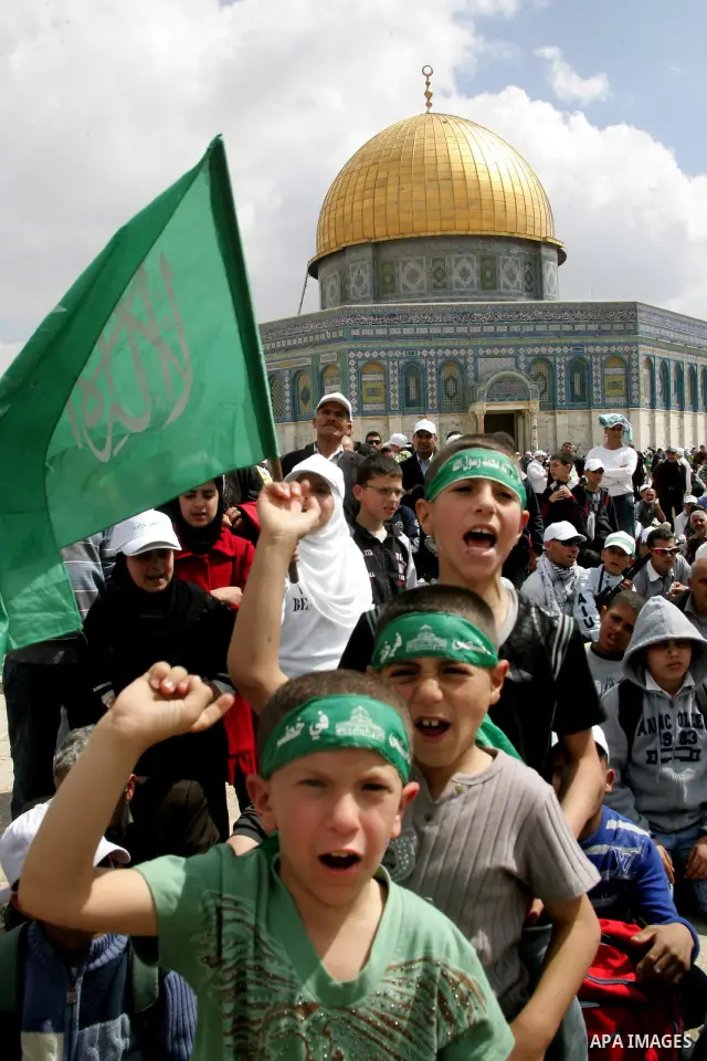 Palestinians take part in a celebration " The box of Al Aqsa child" in front of the Dome of the Rock on the compound known to Muslims as al-Haram al-Sharif, and to Jews as Temple Mount in Jerusalem's Old City on April 23...