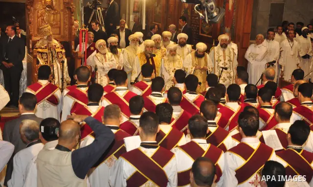 Coptic Christians take part in an Easter service at the main cathedral in Cairo April 23, 2011. This year, the Orthodox and Catholic churches are celebrating Easter on the same date. Photo by Ahmed Asad