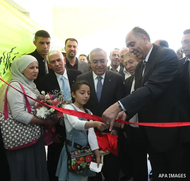 Palestinian Pime Minister, Salam Fayyad during the opening of Khaled Bin Al Waleed Street in west bank city of Hebron on April 24,2011. Photo by Mustafa Abu Dayeh