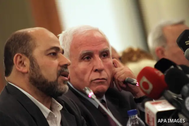 Palestinian Hamas deputy leader Mussa Abu Marzuq speaks during a joint press conference with Fatah delegation chief Azzam al-Ahmed in Cairo on April 27, 2011 as the rival Palestinian groups reached an "understanding" to...