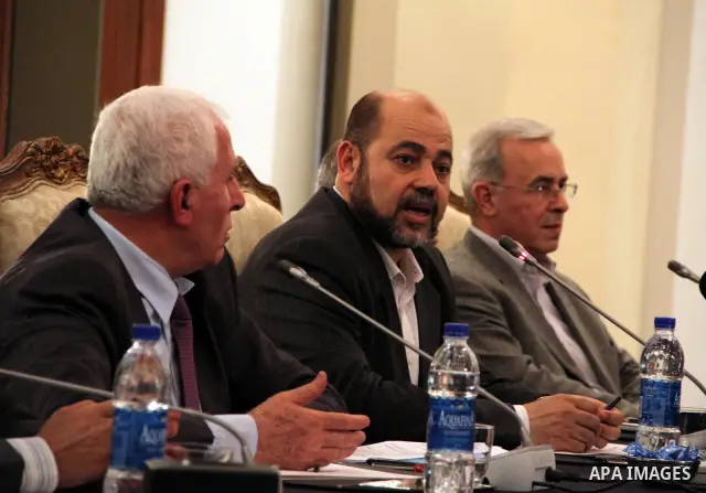Palestinian Hamas deputy leader Mussa Abu Marzuq speaks during a joint press conference with Fatah delegation chief Azzam al-Ahmed in Cairo on April 27, 2011 as the rival Palestinian groups reached an "understanding" to...