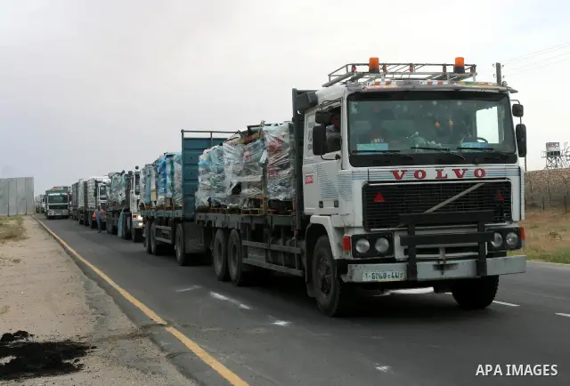 Trucks loaded with goods and equipments are seen after their arrival in the southern Gaza Strip through Kerem Shalom border crossing on April 28, 2011. Photo by Mohammed Asad