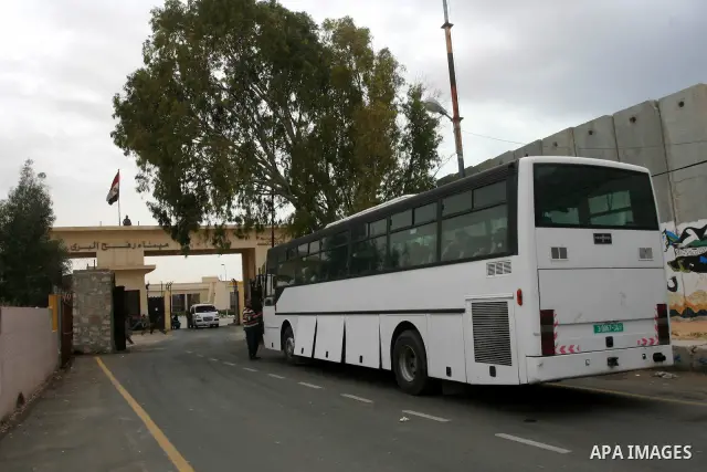 Palestinians ride a bus as they prepare to enter Egypt through Rafah border crossing in their way to Saudi Arabia to perform Ummrah (Religious ritual) on April 28,2011. The Muslims from all over the world visit Holy citi...
