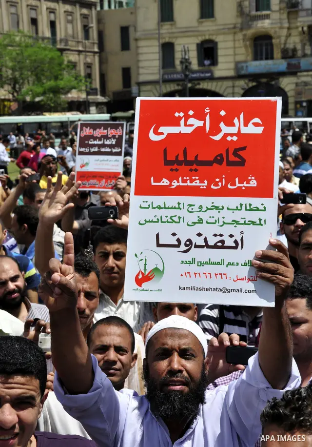 Salafists hold banners calling for the release of Kamilia Shehata, a Muslim woman who according to them is kept by the Coptic Church, during a protest in front of Al Nour mosque in Abbasiya, Cairo, Egypt, 29 April 2011....
