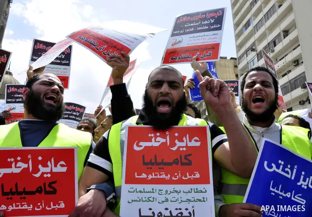 Salafists hold banners calling for the release of Kamilia Shehata, a Muslim woman who according to them is kept by the Coptic Church, during a protest in front of Al Nour mosque in Abbasiya, Cairo, Egypt, 29 April 2011....