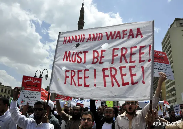 Salafists hold banners calling for the release of Kamilia Shehata, a Muslim woman who according to them is kept by the Coptic Church, during a protest in front of Al Nour mosque in Abbasiya, Cairo, Egypt, 29 April 2011....