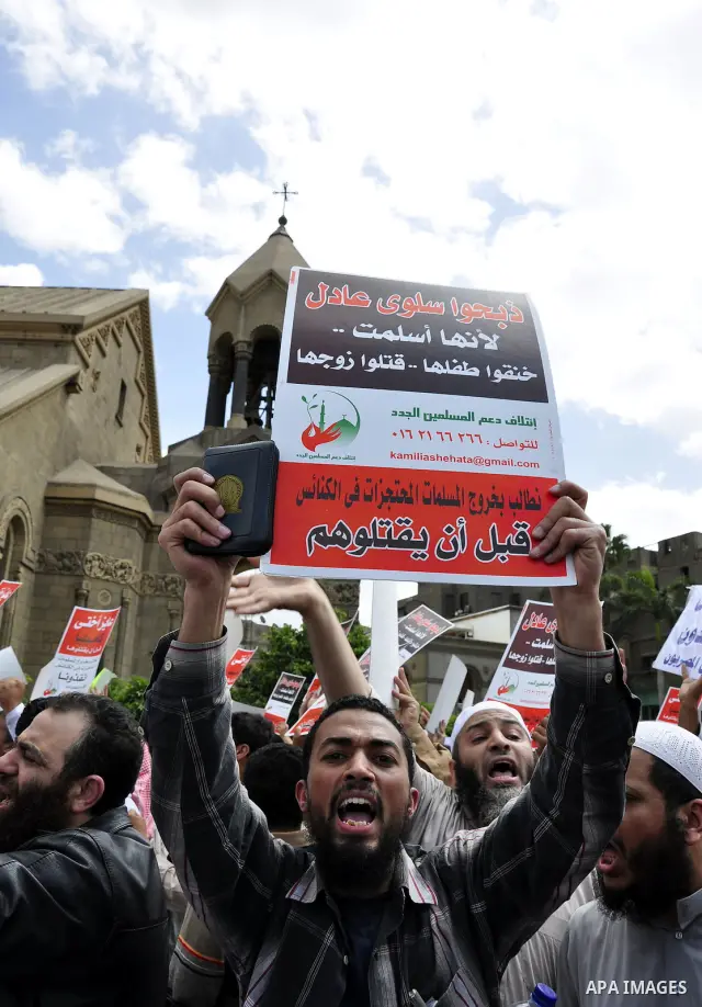 Salafists hold banners calling for the release of Kamilia Shehata, a Muslim woman who according to them is kept by the Coptic Church, during a protest in front of Al Nour mosque in Abbasiya, Cairo, Egypt, 29 April 2011....