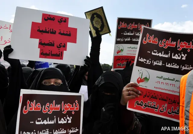 Salafists hold banners calling for the release of Kamilia Shehata, a Muslim woman who according to them is kept by the Coptic Church, during a protest in front of Al Nour mosque in Abbasiya, Cairo, Egypt, 29 April 2011....