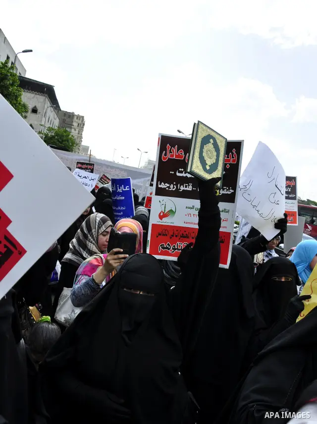 Salafists hold banners calling for the release of Kamilia Shehata, a Muslim woman who according to them is kept by the Coptic Church, during a protest in front of Al Nour mosque in Abbasiya, Cairo, Egypt, 29 April 2011....