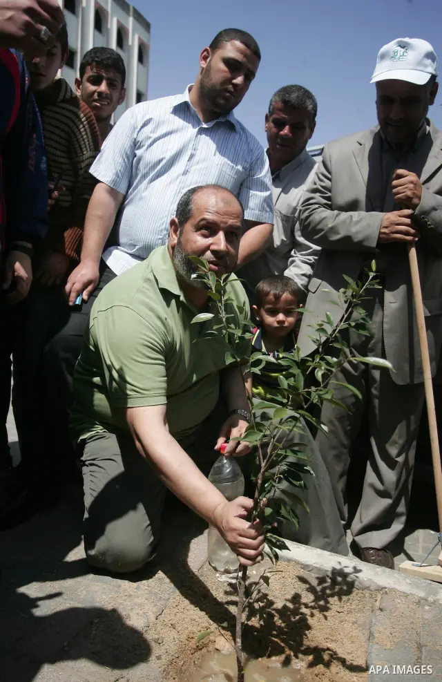 Palestinian Hamas leader, Khaleel Al-Hayia Participate in cleaning streets and planting olive trees during a campaign organized by Hamas in Gaza City on May 1, 2011. Photo by Mohammed Othman