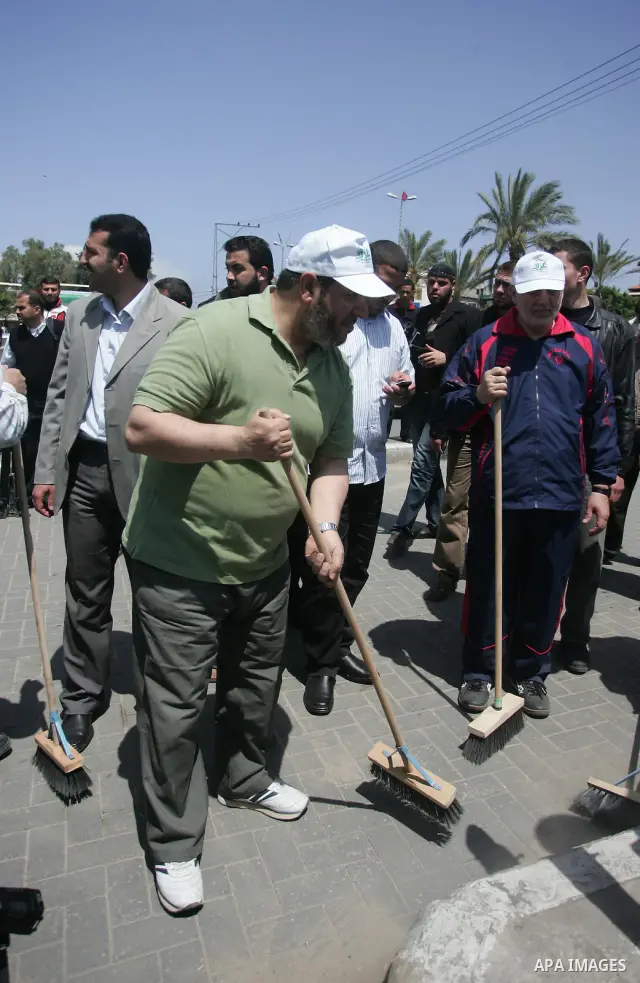 Palestinian Hamas leader, Khaleel Al-Hayia Participate in cleaning streets and planting olive trees during a campaign organized by Hamas in Gaza City on May 1, 2011. Photo by Mohammed Othman